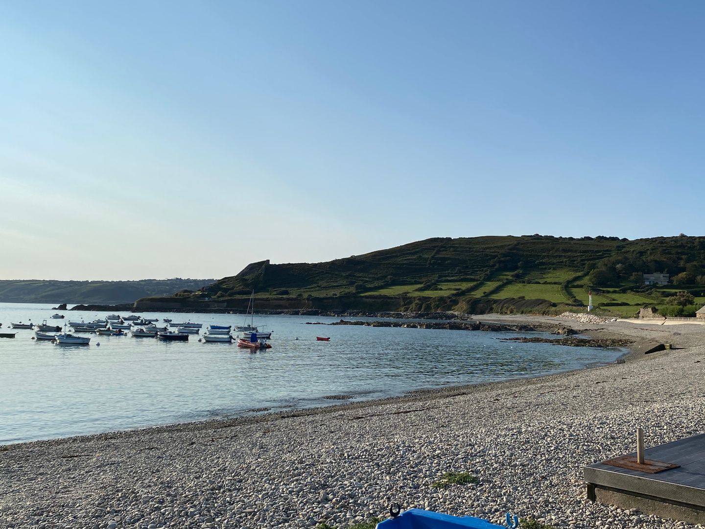 A beach with boats on it.