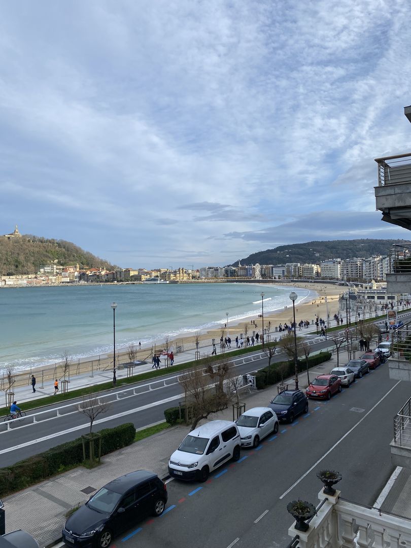 A view of the beach from an apartment in barcelona.