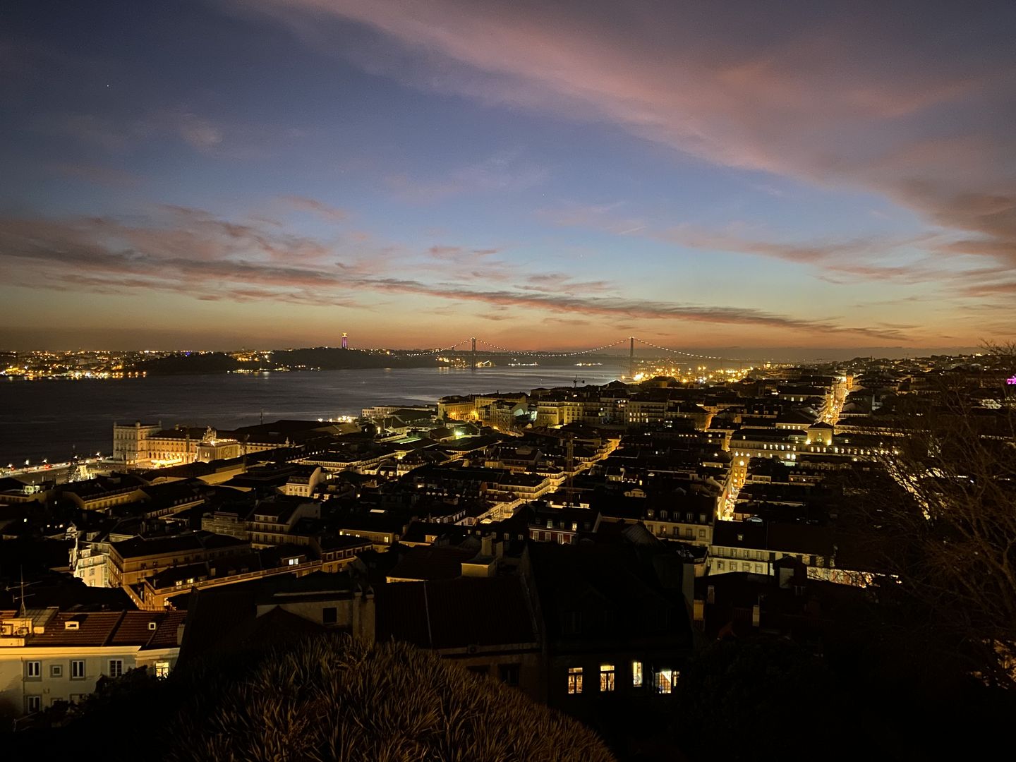 The city of lisbon at dusk.